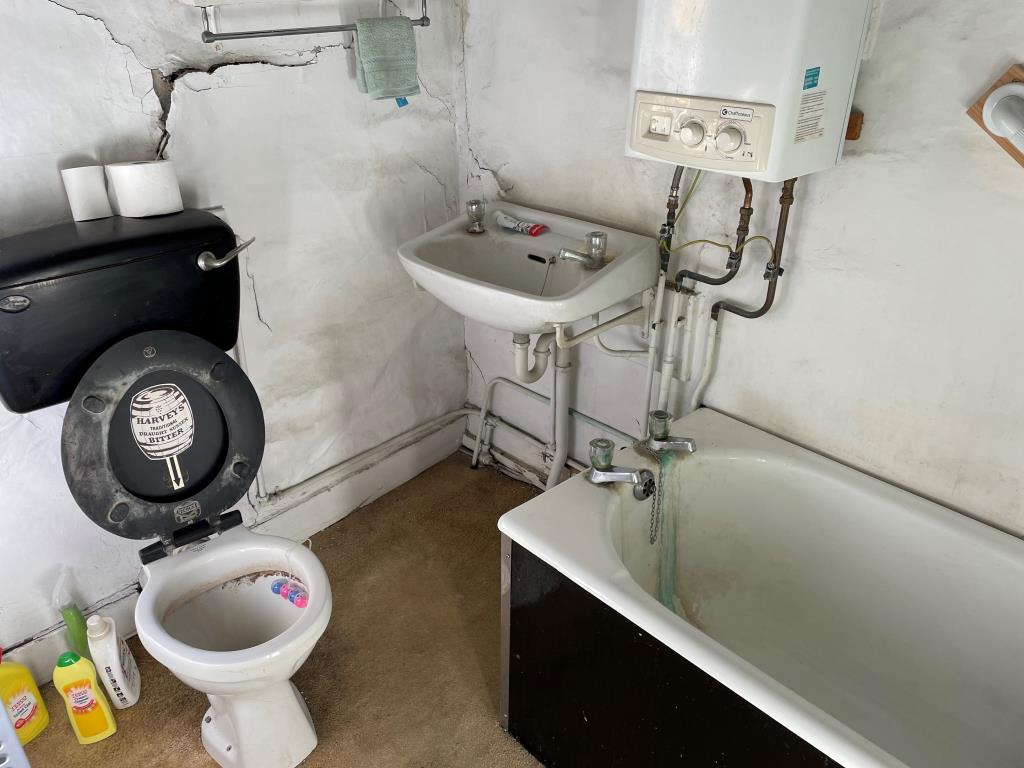 Lot: 119 - CHARACTER COTTAGE IN NEED OF IMPROVEMENT - Bathroom with sink WC and boiler